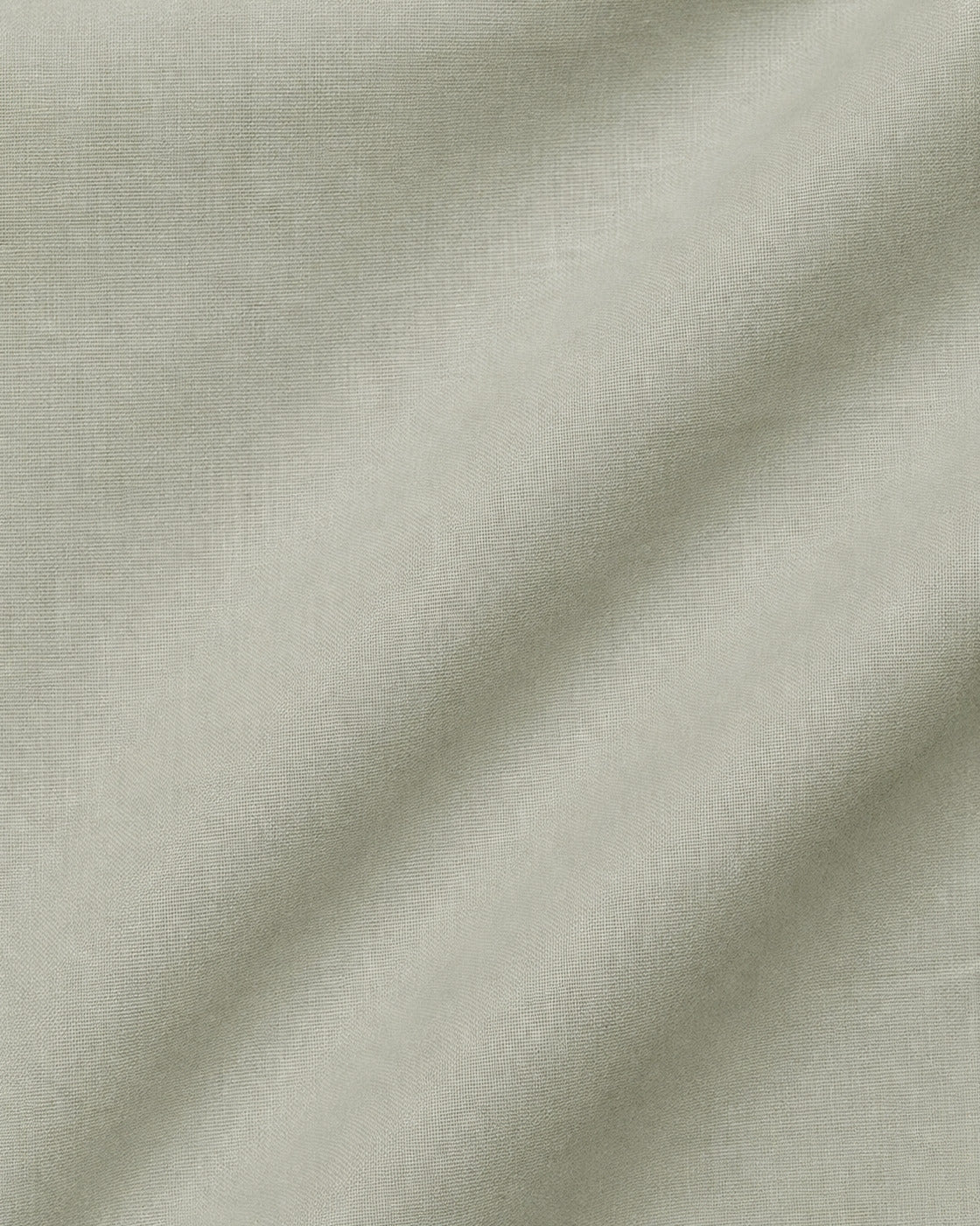 Close-up of sage green cotton percale, crisp and matte