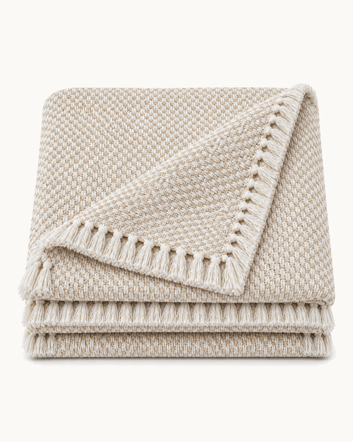 Basketweave Cotton Throw, folded on a plain background