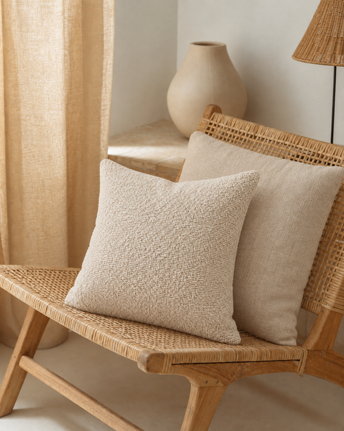 Bouclé Throw Pillow Cover, grouped with other cushions on a bench