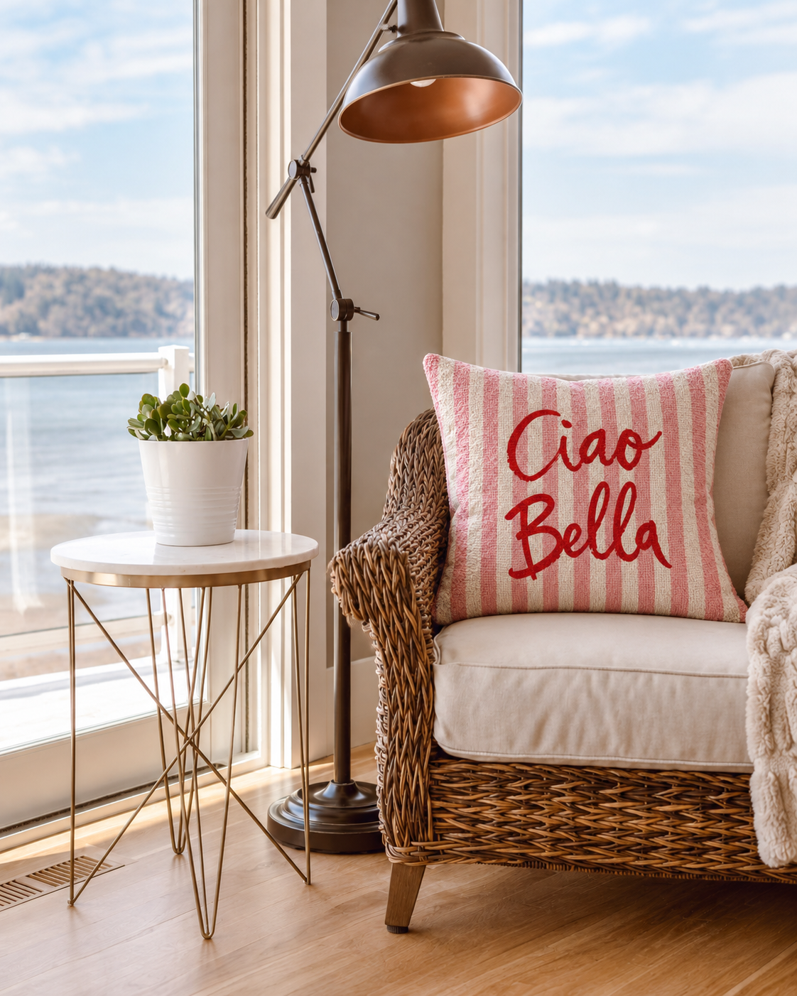 Ciao Bella Stripe Cotton-Linen Pillow Cover, on a rattan armchair
