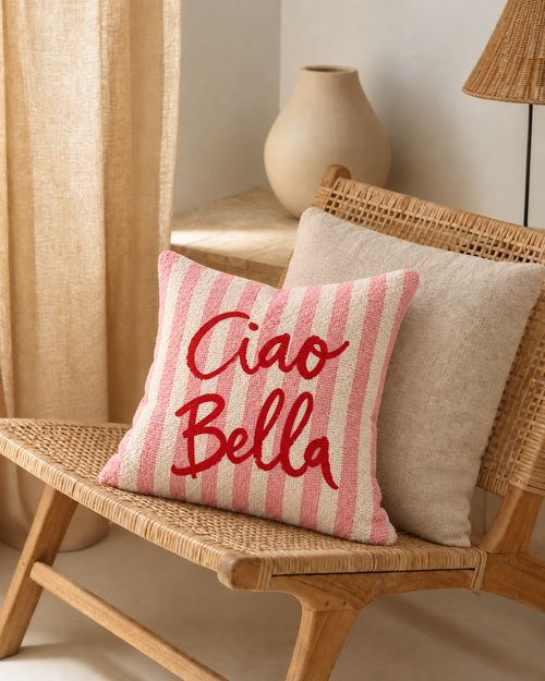 Ciao Bella Stripe Cotton-Linen Pillow Cover, on a rattan armchair