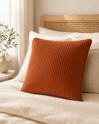 Corduroy Velvet Pillow Cover — on a made bed, morning light