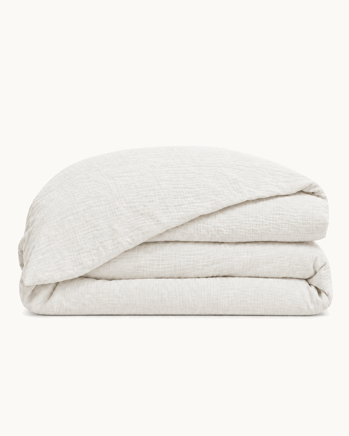 Cotton Muslin Duvet Cover, folded on a plain background