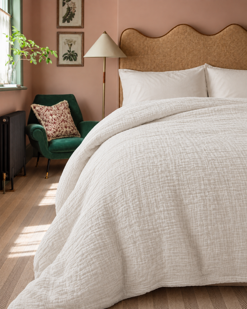 Cotton Muslin Duvet Cover, on a made bed in morning light