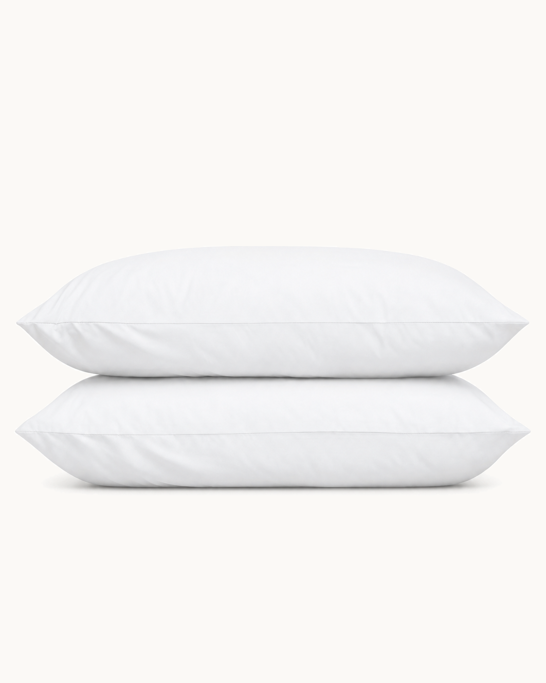 Cotton Percale Pillowcases, one case on a pillow, one folded, on a plain background