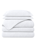 Cotton Quilt Set, the set folded on a plain background