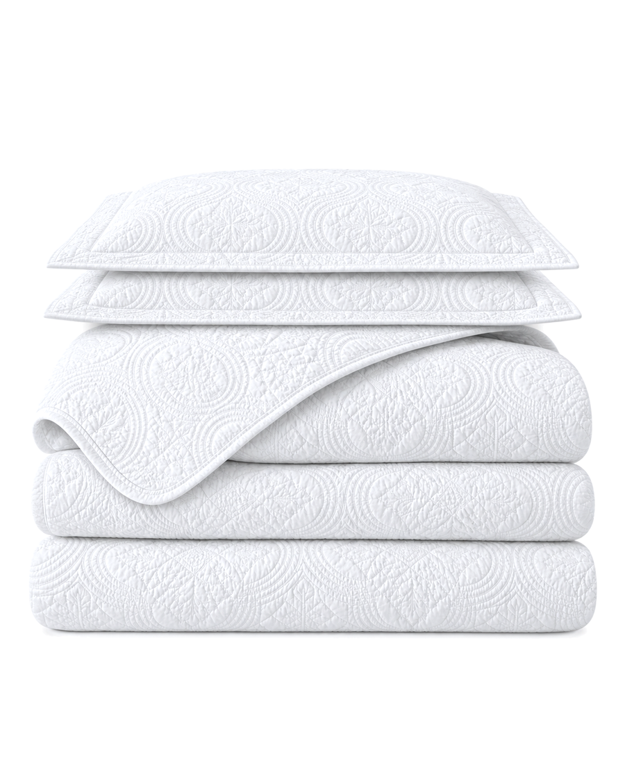 Cotton Quilt Set, the set folded on a plain background