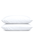 Cotton Sateen Pillowcases, one case on a pillow and one folded, on a plain background