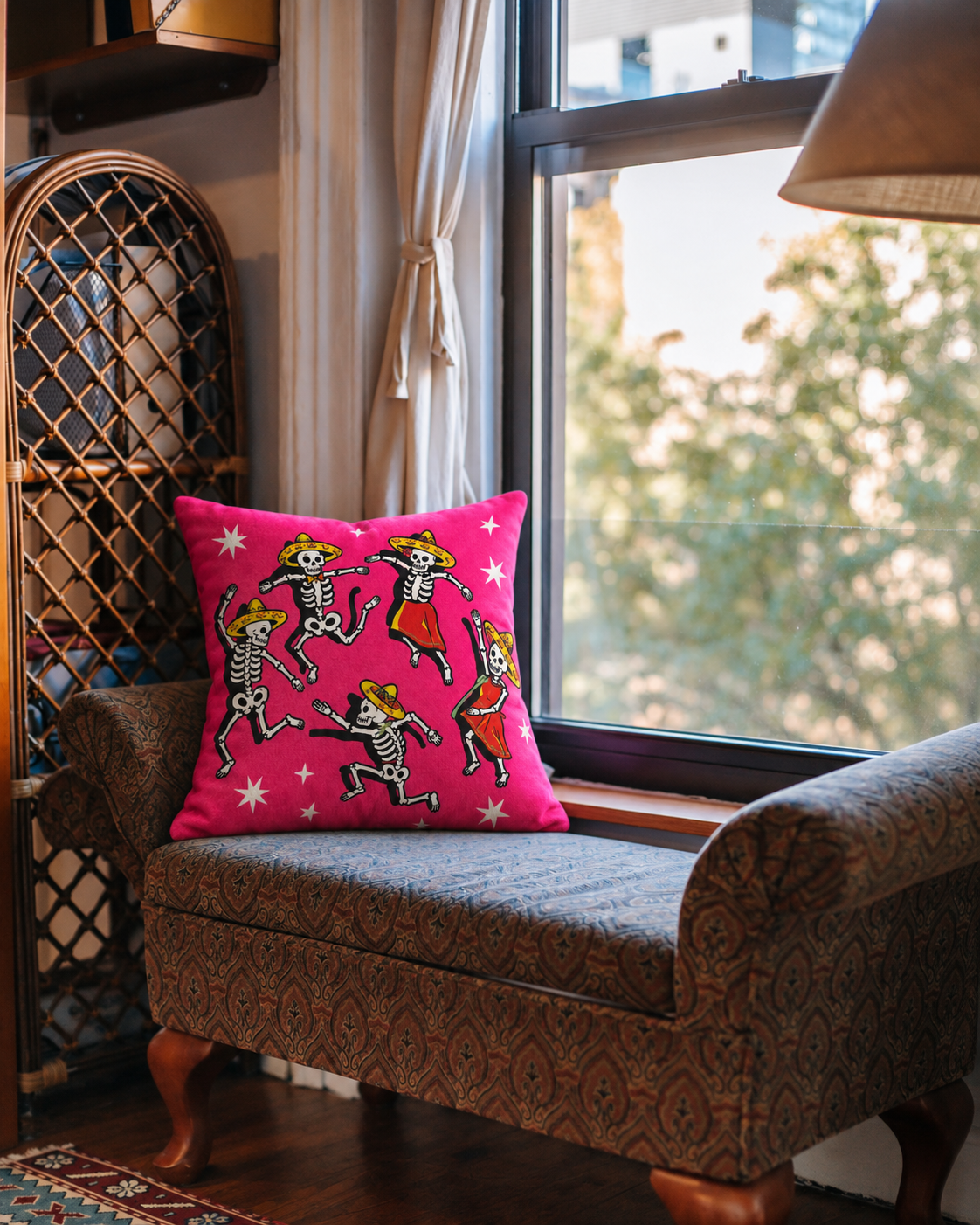 Dancing Skeletons Cotton Velvet Pillow Cover, on a linen sofa