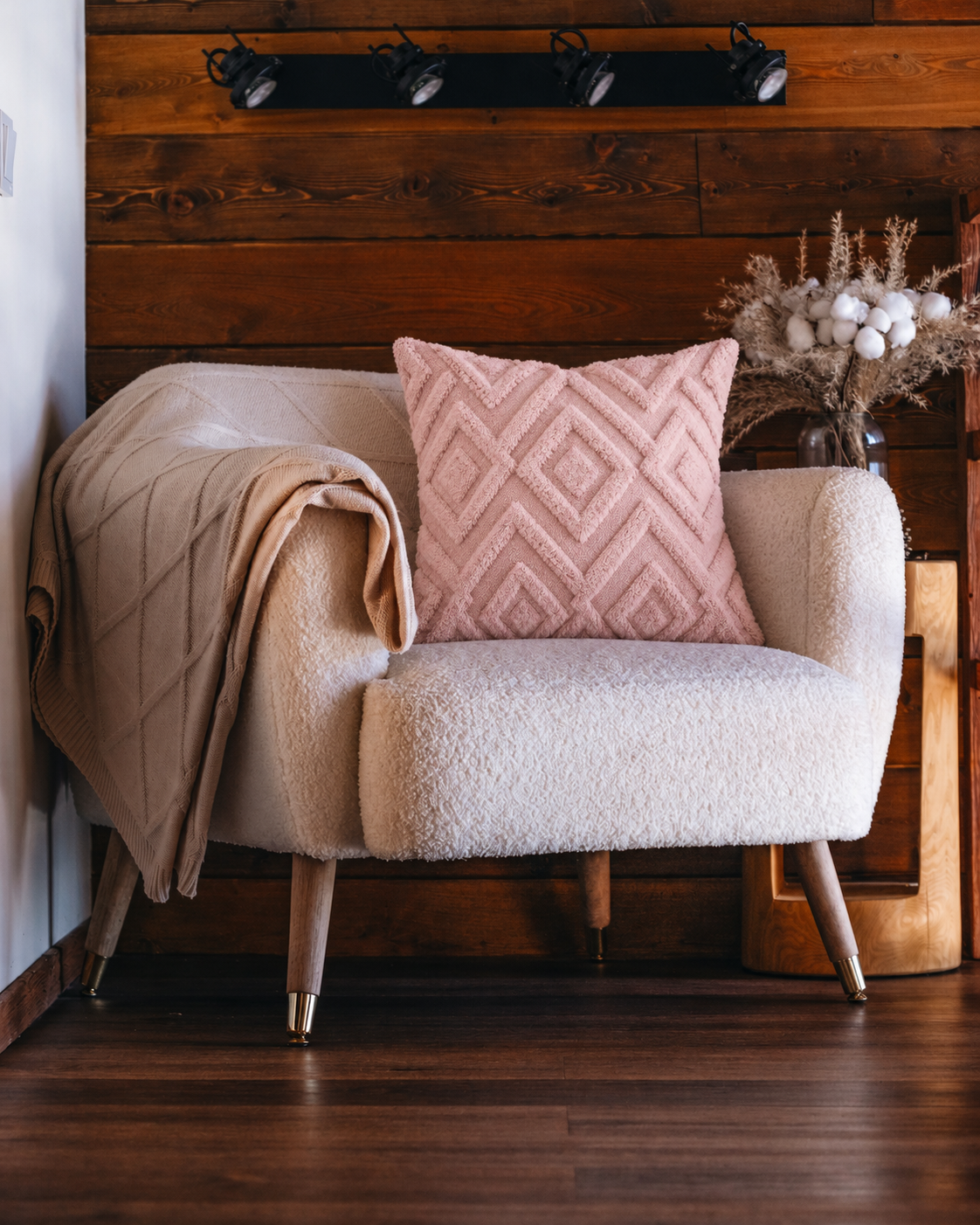 Diamond Tufted Cotton Pillow Cover in Blush, on a rattan armchair