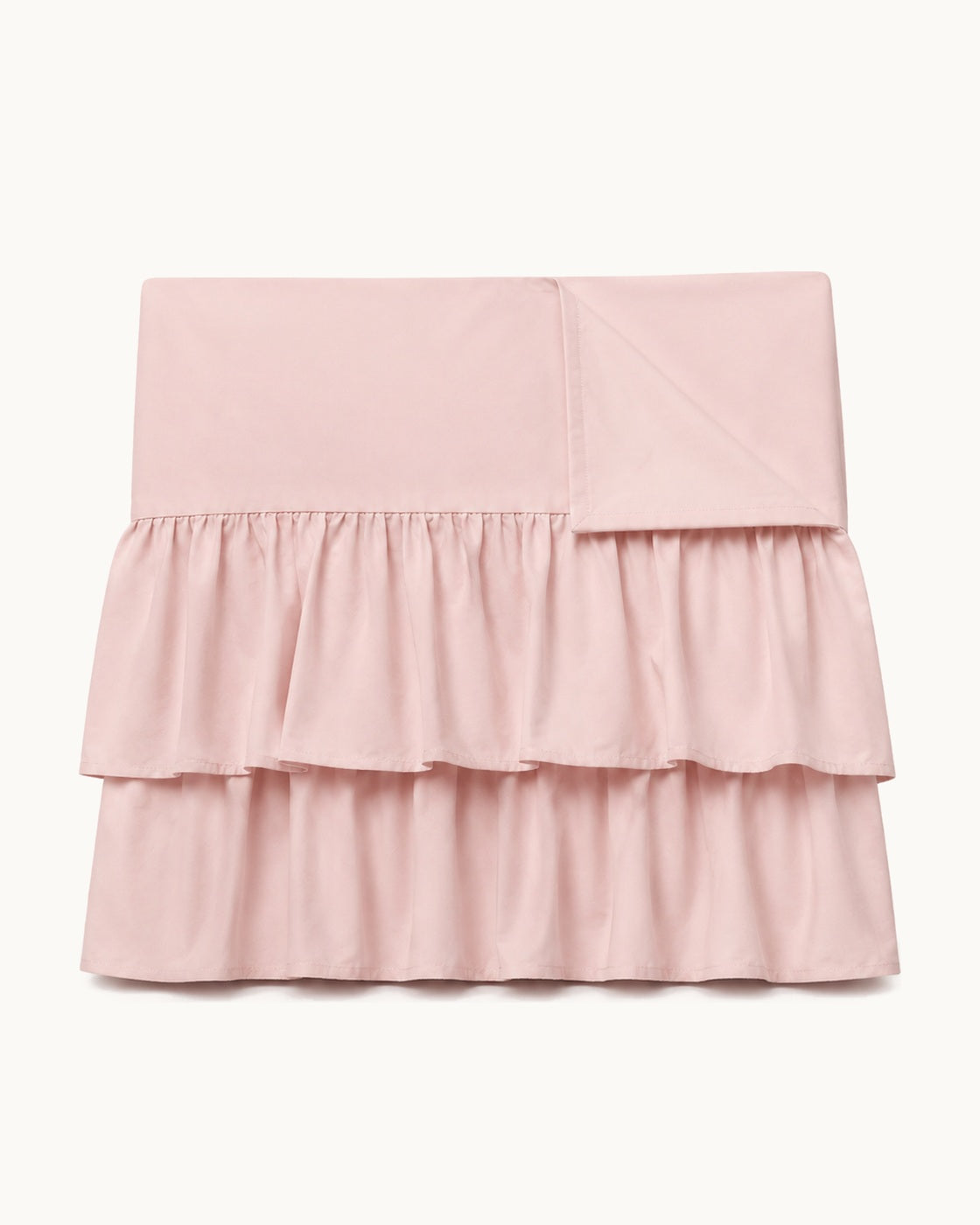 Double Ruffle Bed Skirt — folded set on a plain background