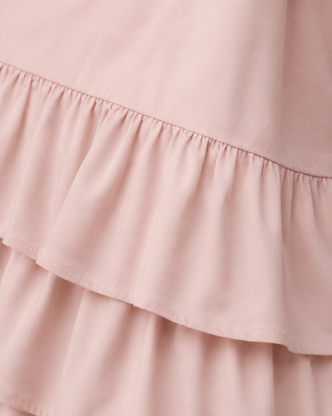 Double Ruffle Bed Skirt — close-up on a fold