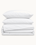 Egyptian Cotton Sheet Set, the four pieces folded on a plain background