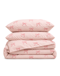 Embroidered Bow Cotton Sateen Duvet Cover Set in Blush, folded with its shams