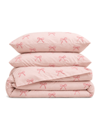 Embroidered Bow Cotton Sateen Duvet Cover Set in Blush, folded with its shams