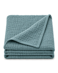 Four-Layer Cotton Gauze Throw, folded on a plain background
