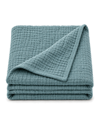 Four-Layer Cotton Gauze Throw, folded on a plain background