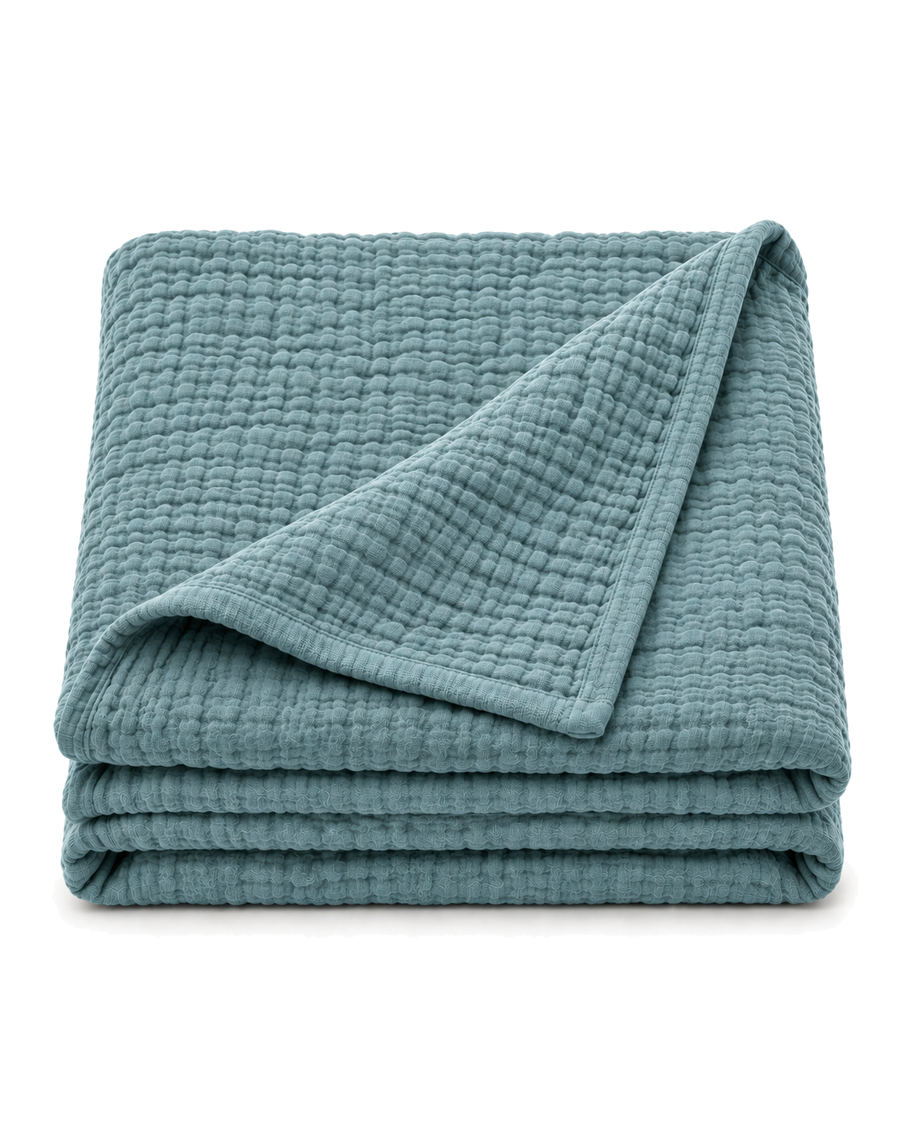 Four-Layer Cotton Gauze Throw, folded on a plain background