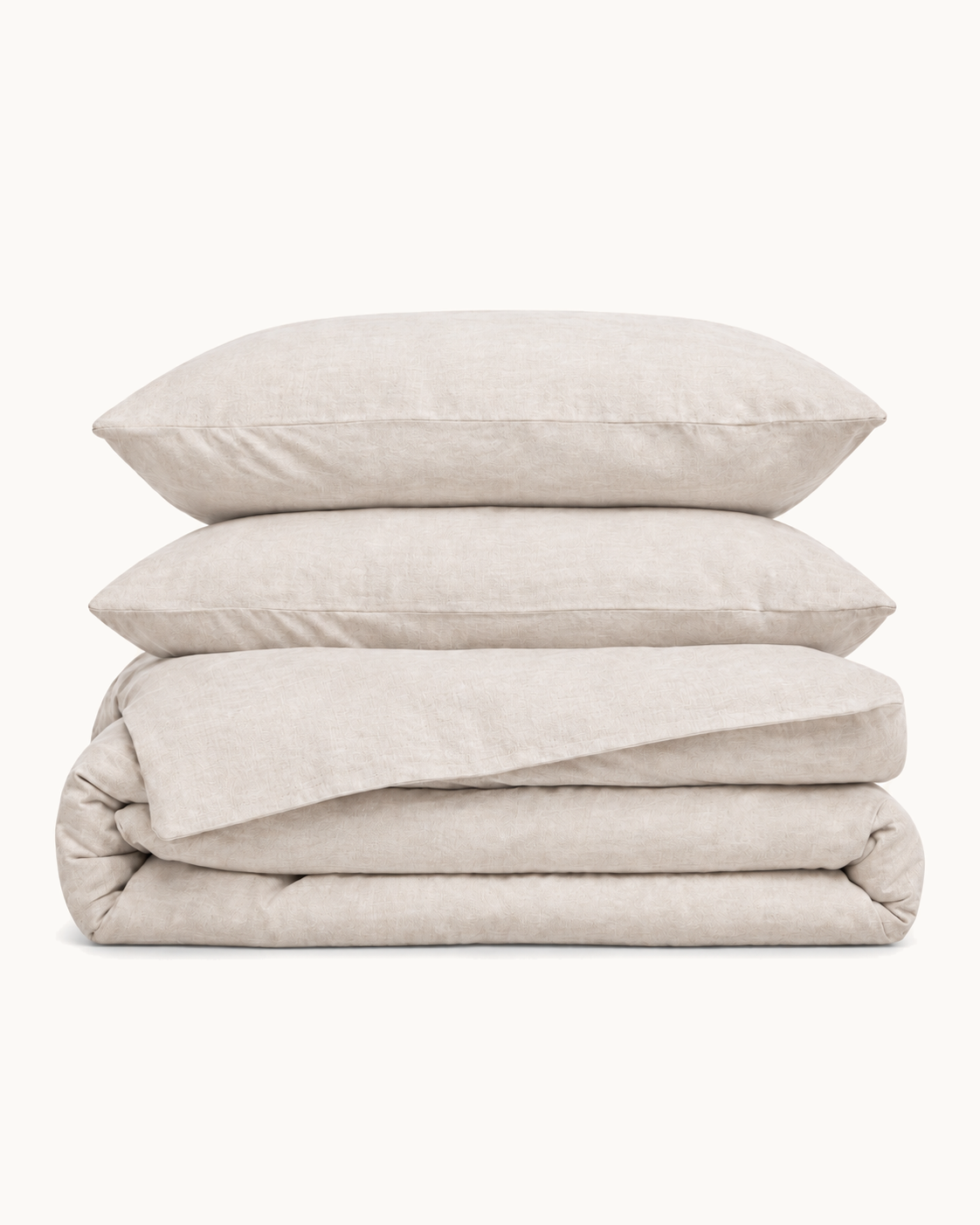 French Flax Linen Duvet Set, the full set folded on a plain background