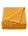Fringed Diamond Knit Cotton Throw in Mustard, folded