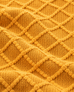 Fringed Diamond Knit Cotton Throw in Mustard, fabric close-up