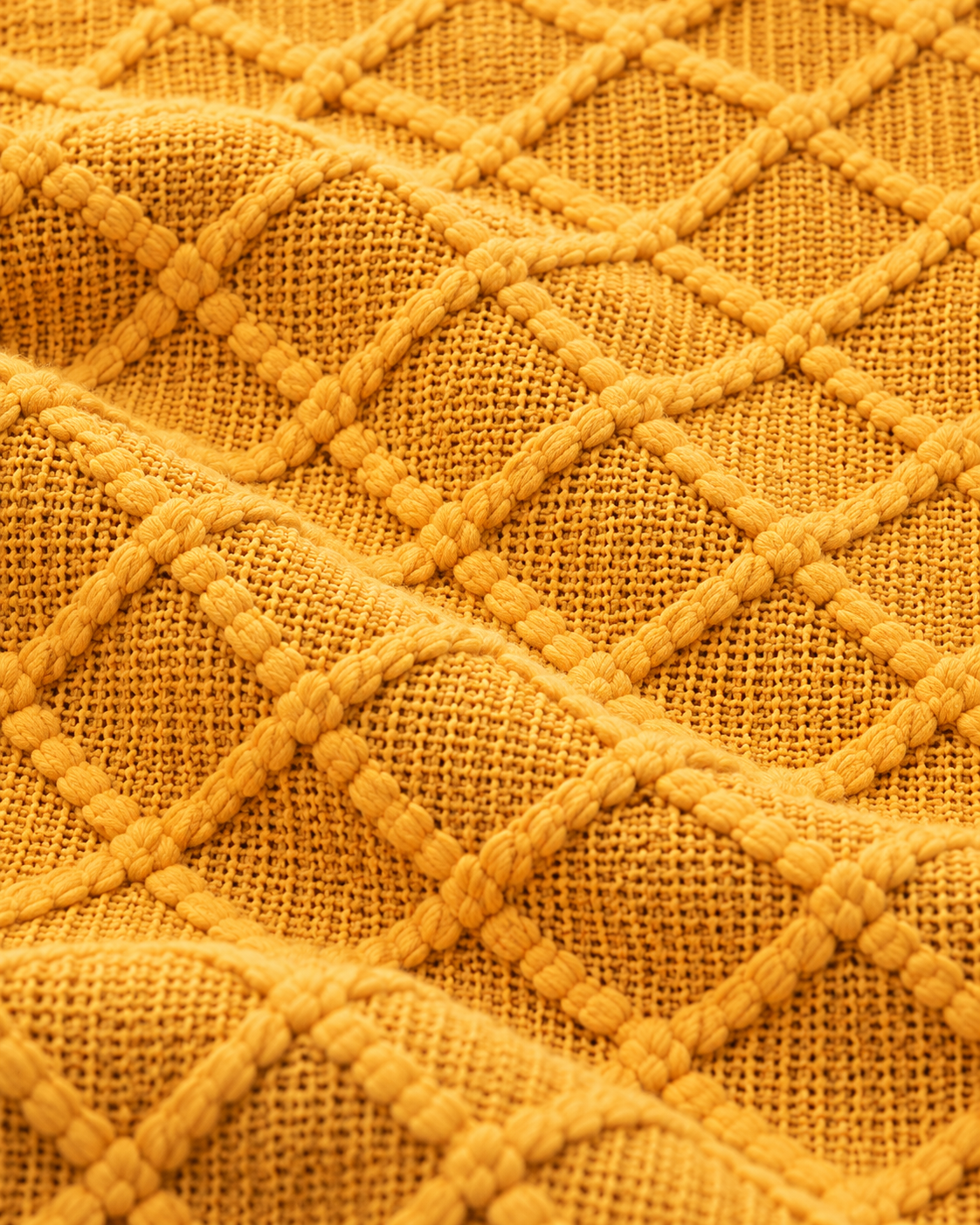 Fringed Diamond Knit Cotton Throw in Mustard, fabric close-up