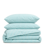 Jacquard Stripe Cotton Seersucker Duvet Cover Set in Sky, folded with its shams