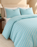 Jacquard Stripe Cotton Seersucker Duvet Cover Set in Sky, made bed seen from above