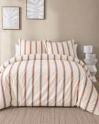 Woven Stripe Duvet Cover Set in Terracotta, front bedroom view with matching taupe rug