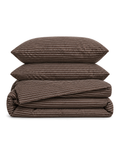 Pinstripe Cotton Seersucker Duvet Cover Set in Cocoa, folded with its shams