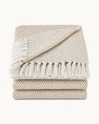 Basketweave Cotton Throw, folded on a plain background