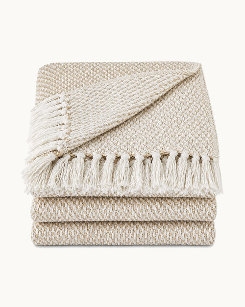 Basketweave Cotton Throw, folded on a plain background