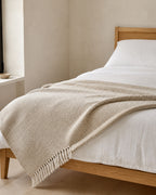 Basketweave Cotton Throw, folded across the foot of a bed