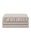 Belgian Linen Bed Skirt, the set folded on a plain background