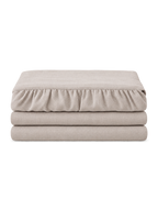 Belgian Linen Bed Skirt, the set folded on a plain background