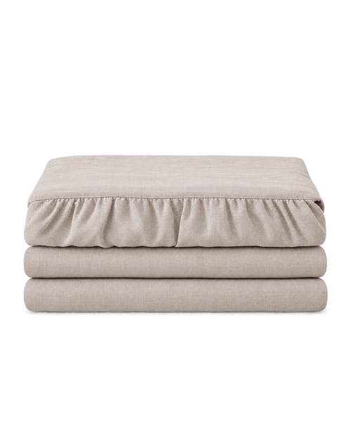 Belgian Linen Bed Skirt, the set folded on a plain background