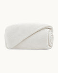Cotton Muslin Duvet Cover, folded on a plain background