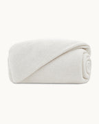 Cotton Muslin Duvet Cover, folded on a plain background