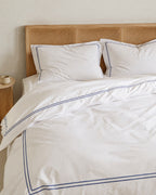 Cotton Percale Duvet Cover Set, on a made bed in morning light