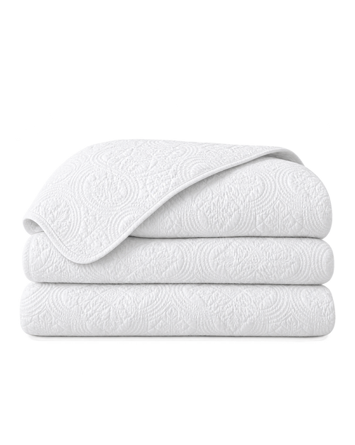 Cotton Quilt Set, the set folded on a plain background