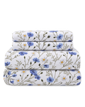 Floral Percale Sheet Set, the four pieces of the set folded on a plain background