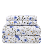 Floral Percale Sheet Set, the four pieces of the set folded on a plain background