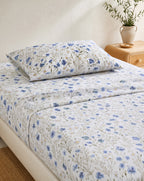 Floral Percale Sheet Set, on a made bed in morning light