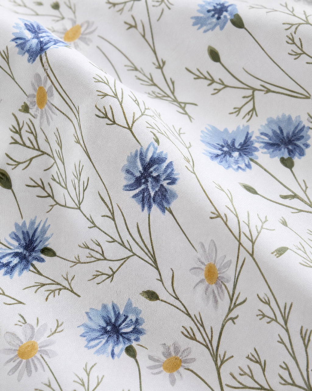 Floral Percale Sheet Set, close-up on a fold of the printed percale