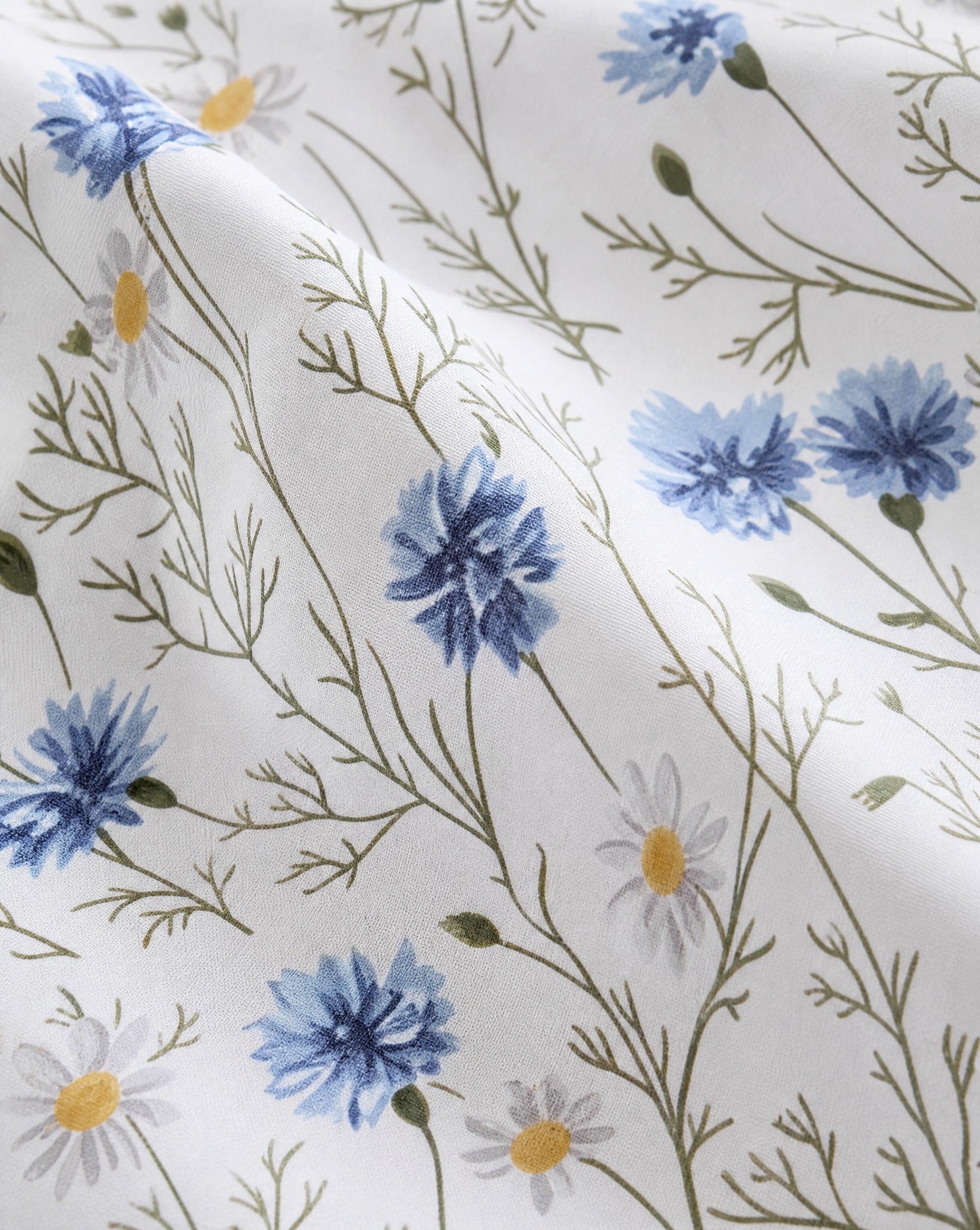 Floral Percale Sheet Set, close-up on a fold of the printed percale