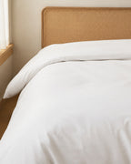 Cotton Percale Duvet Cover, on a made bed in morning light