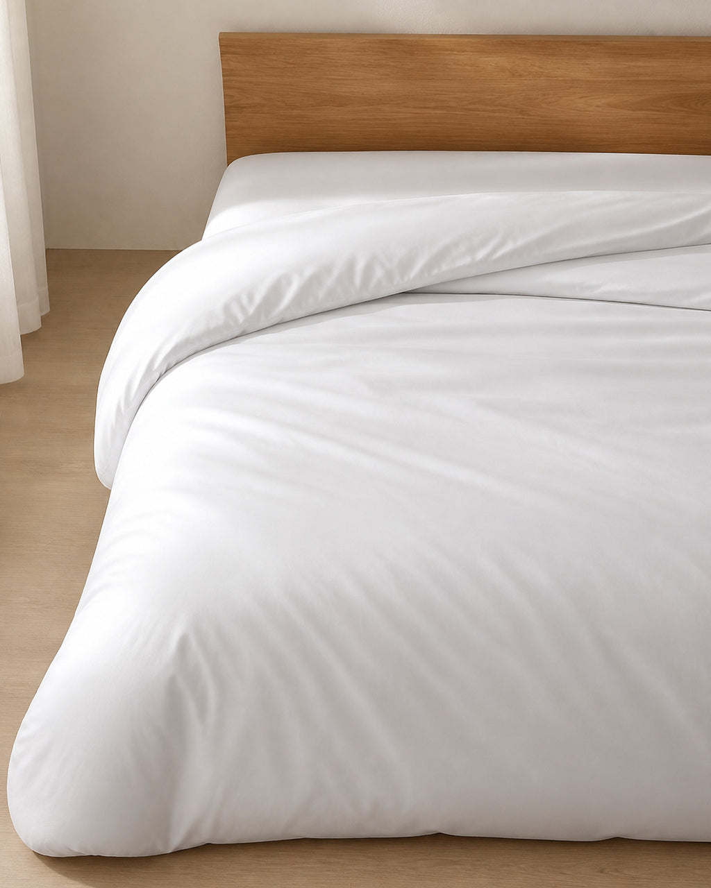 Egyptian Cotton Sateen Duvet Cover, on a made bed in raking light