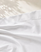 Egyptian Cotton Sheet Set, close-up on the wide top hem of the flat sheet