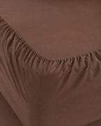 Washed Cotton Sheet Set, close-up on the elasticated corner of the fitted sheet