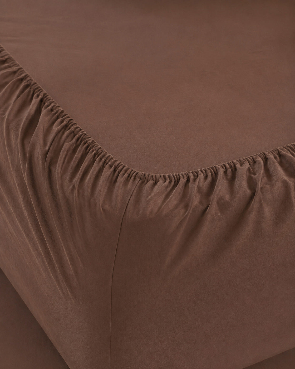 Washed Cotton Sheet Set, close-up on the elasticated corner of the fitted sheet